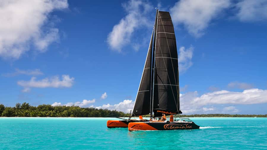 Bora Bora: Sunset Catamaran Cruise with Snacks and Drinks - Leaving your hotel by speedboat