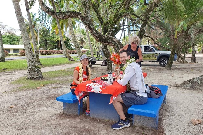'Explore' Rarotonga Guided Bike Tour with Lunch and Swim - Titikaveka adds beaches, gardens, and an unfinished hotel