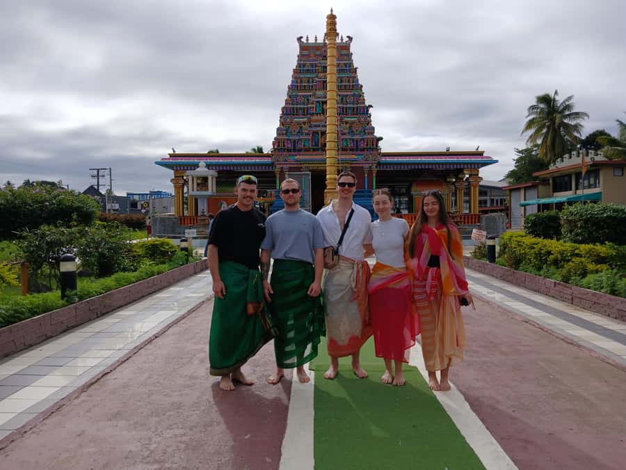 Fiji: Nadi Tour with Tifajek Mudpool and Hotspring Visit - Walking among tropical plants at the Garden of the Sleeping Giant