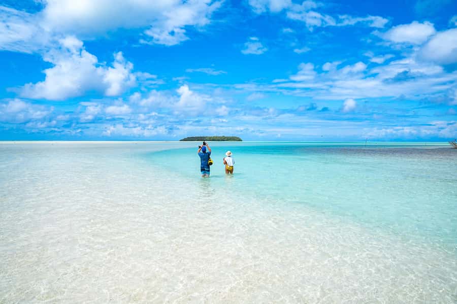 From Tahiti: Tetiaroa Island Tour by Sailing Catamaran - Approaching Tetiaroa by dinghy