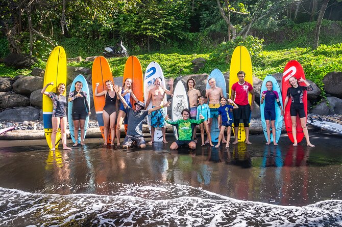 Group Guided Surfing Lesson in Tahiti - Learning to stand, balance, and catch a wave