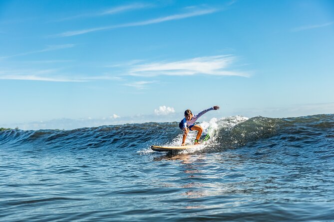 Group Guided Surfing Lesson in Tahiti - Heading east to Tahiti’s black-sand beaches