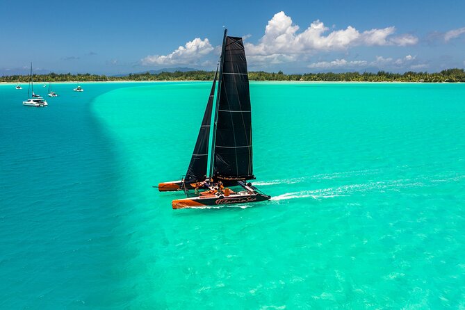 LUXURY Catamaran Bora Bora : Sailing, Snorkeling & Floating Bar - On deck: comfort, views, and the sailing rhythm