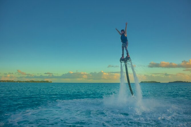 Private Flyboarding Experience in Bora Bora with Pickup - Fitting the helmet, vest, and flyboard boots