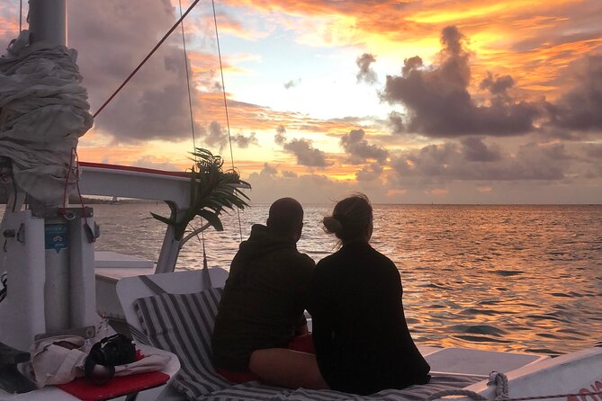 PRIVATE Sunset Cruise : Moorea Sailing on a Catamaran named Taboo - Returning through Ōpūnohu Bay at dusk