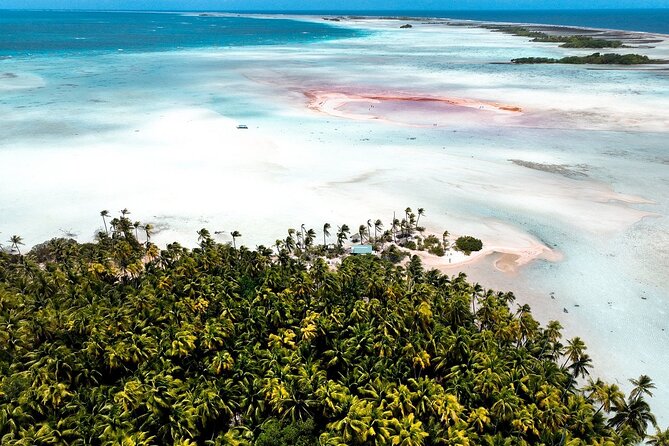 REEF ISLAND | private island | pink sand | natural swimming pools - Leaving the motu for Tiputa Pass