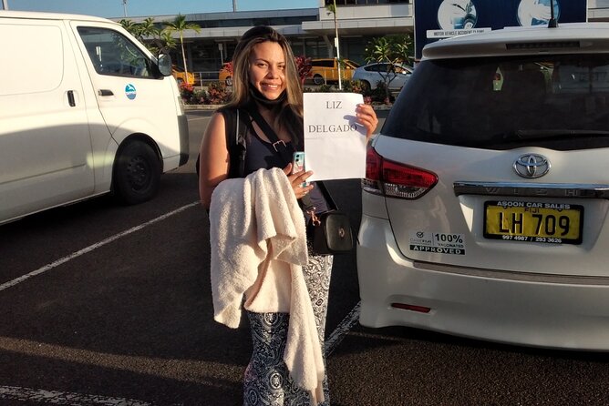 Round Trip Private Transfer From Nadi Airport To Your Resort - Leaving Nadi Airport with a name sign and a private car