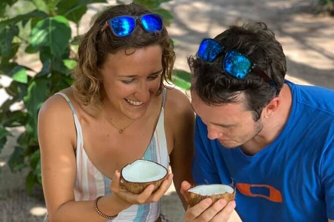 Snorkeling BBQ and Things to do on a Private Motu in Bora Bora - Coconut demonstration and pareo dyeing