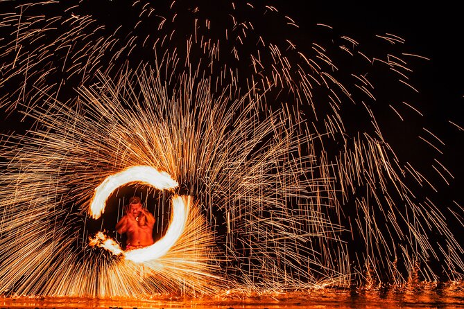 Sunset Cruise with Dinner and Fire Show - Arriving to kava, songs, and island traditions