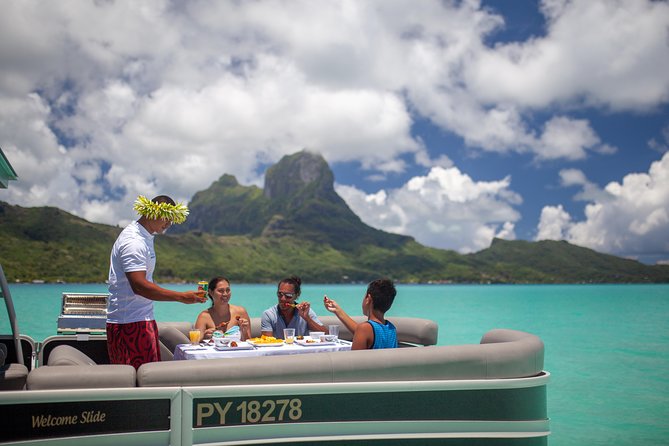 Toa Boat Bora Bora Private Lagoon tour with Lunch on Ambassador Boat - Lunch, beer, punch, and champagne on the water