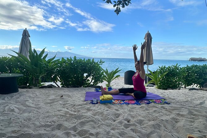 Yoga at sunrise at Sofitel Moorea, overlooking Tahiti - Why this Moorea yoga class feels different